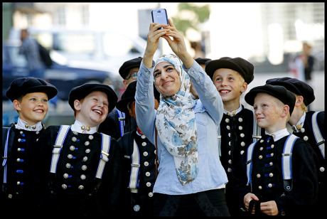  A woman takes a selfie with boys from Spakenburg gallery